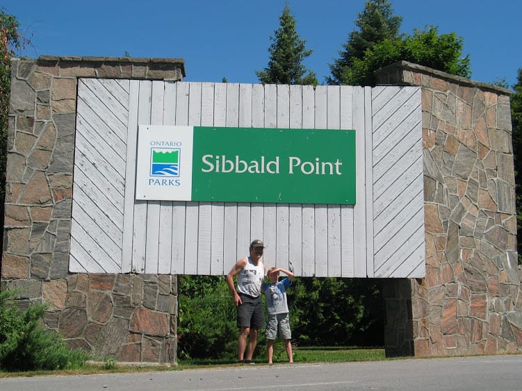 sign of sibbald point provincial park with two campers who are camping at sibbald point