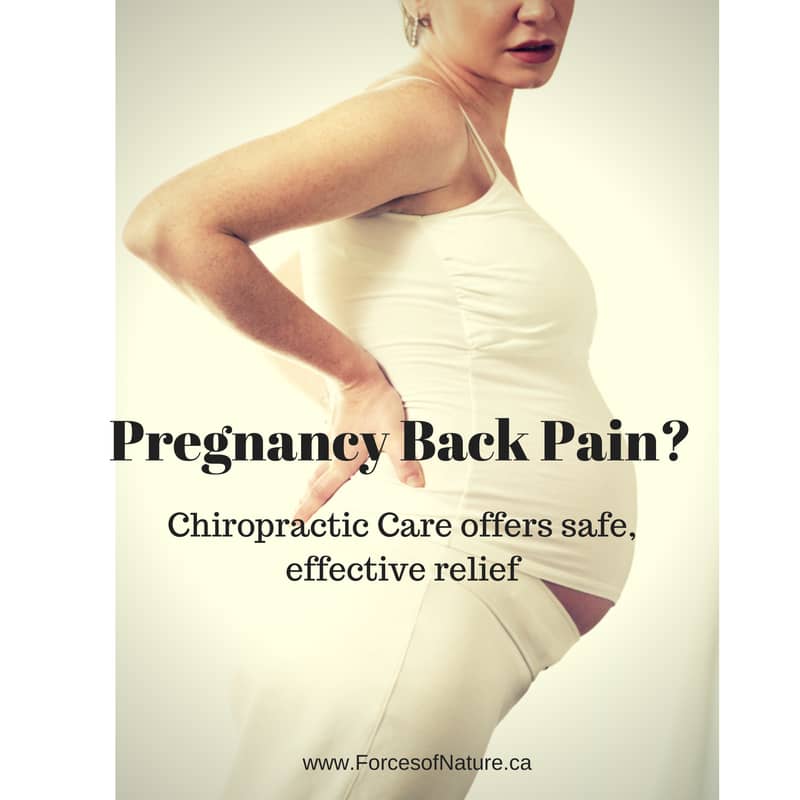 woman experiencing pregnancy back pain