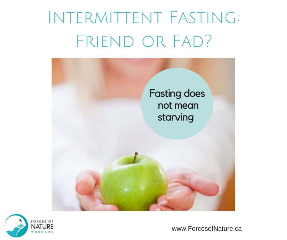 woman holding apple for intermittent fasting
