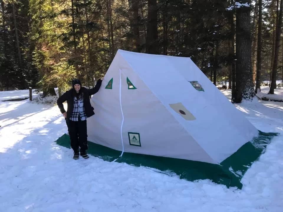 picture of camper christina winter camping with her winter camping hot tent 